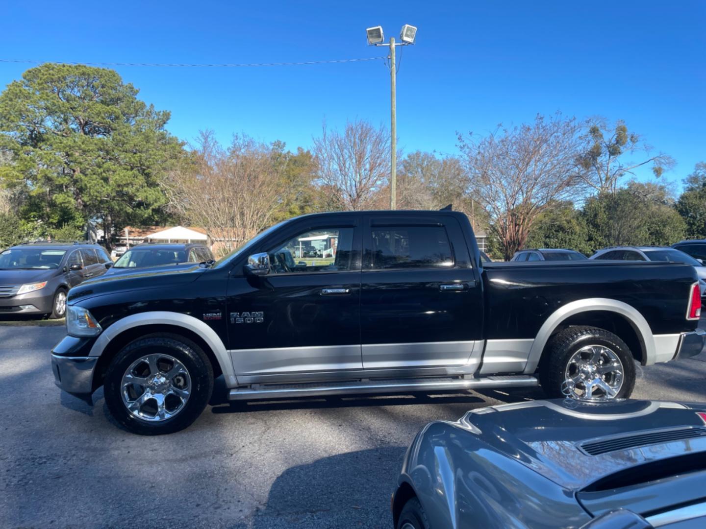 2014 BLACK RAM 1500 LARAMIE (1C6RR6VTXES) with an 5.7L engine, Automatic transmission, located at 5103 Dorchester Rd., Charleston, SC, 29418-5607, (843) 767-1122, 36.245171, -115.228050 - Photo#3